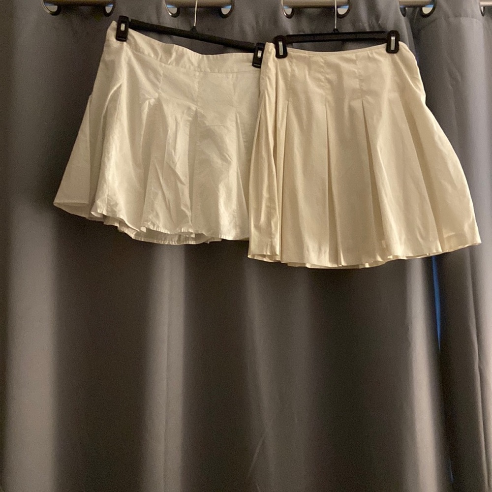 Bundle  of two ecru/white all cotton skirts. Size 2